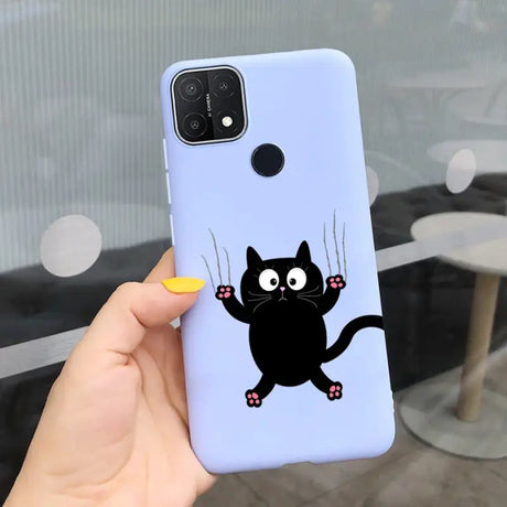 a person holding a phone case with a black cat on it