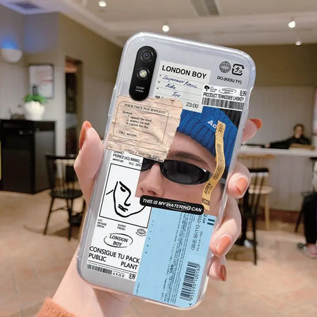 a person holding up a phone case with a ticket