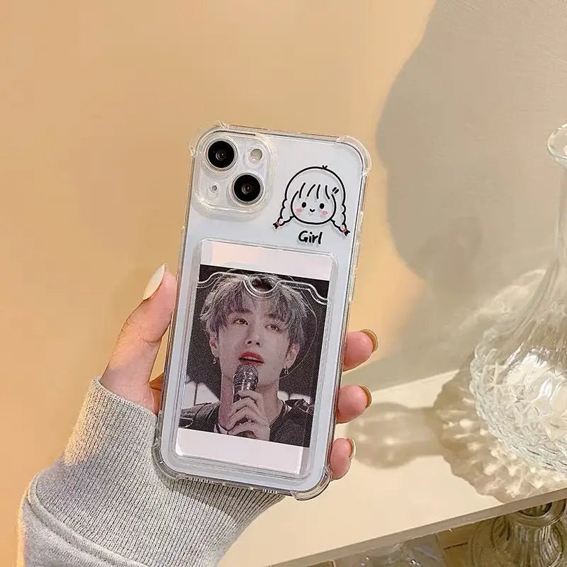a person holding a phone case with a picture of a person on it