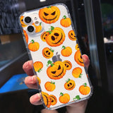 a person holding a phone case with pumpkins on it