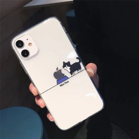 a person holding a phone case with a cat on it