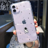 a person holding a phone case with a sticker on it