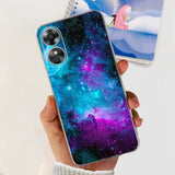 a person holding a phone case with a galaxy design