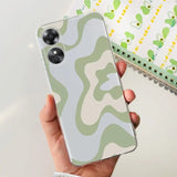 a person holding a phone case with a camouflage pattern