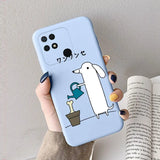a person holding a phone case with a cartoon character