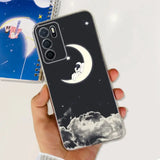 a hand holding a phone case with a moon and stars in the sky