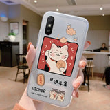 a person holding a phone case with a cat on it