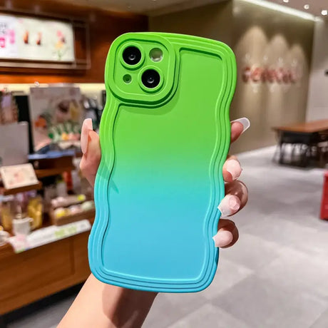 a person holding a phone case in their hand