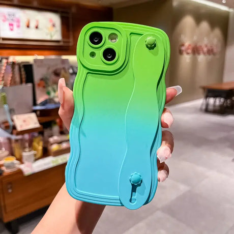 a person holding a phone case in their hand