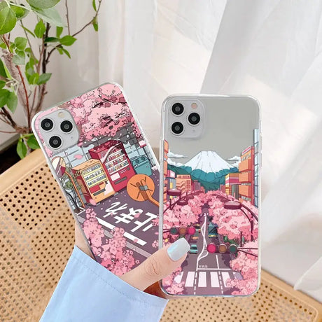 a person holding a phone case with a picture of a city