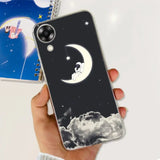 a person holding a phone case with a moon and stars in the sky