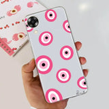 a person holding a phone case with pink eyes