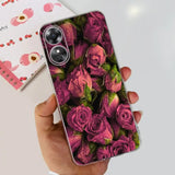 a person holding a phone case with pink roses