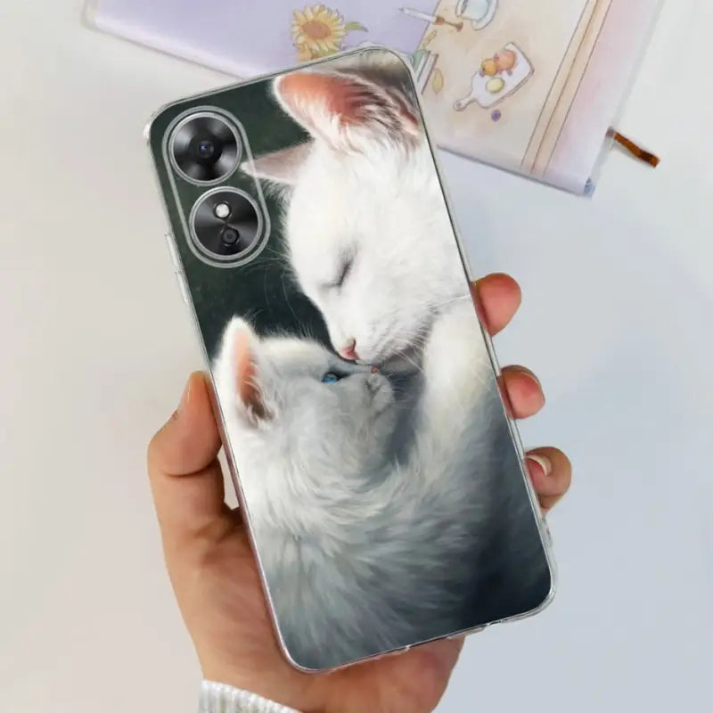 a person holding a phone case with a cat on it