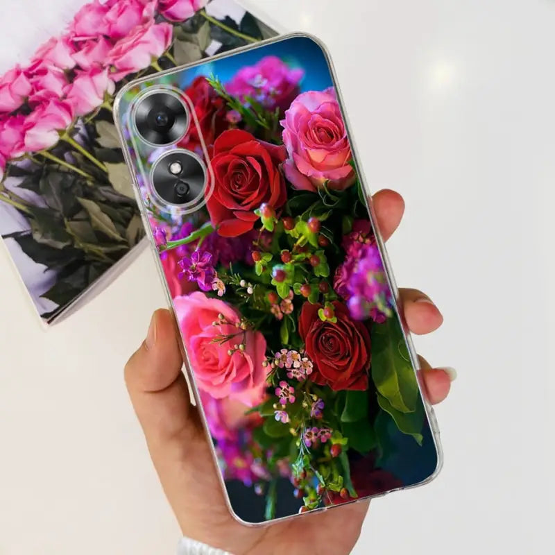 a person holding a phone case with flowers