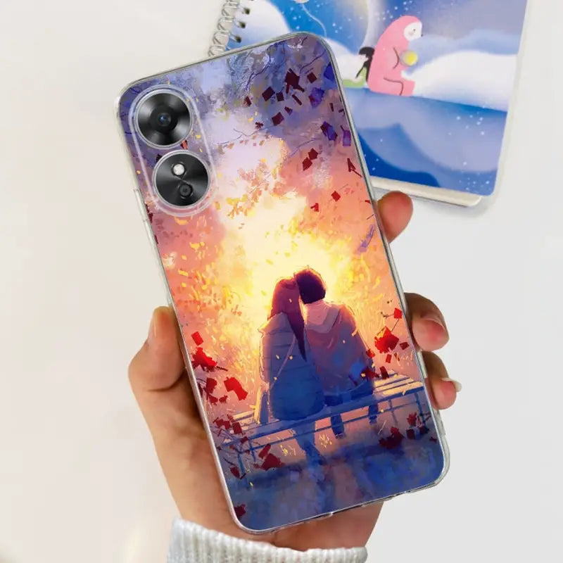 a person holding a phone case with a picture of a girl and a cat