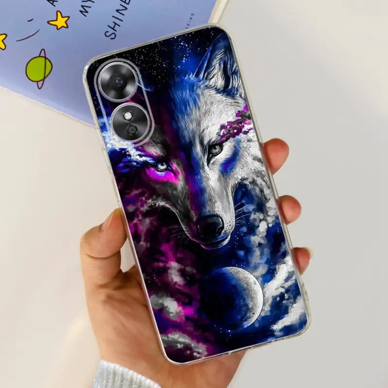 a person holding a phone case with a wolf on it