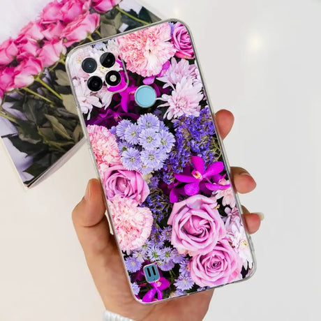 a person holding a phone case with flowers on it