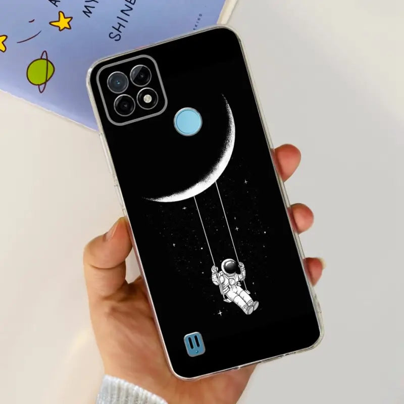 a person holding a phone with a cartoon design on it