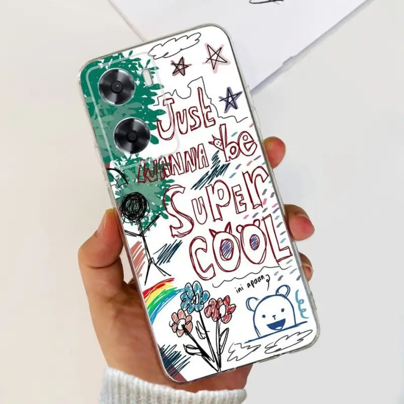 a person holding a phone case with a drawing on it