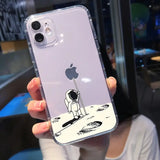 a person holding a phone case with a cartoon drawing on it