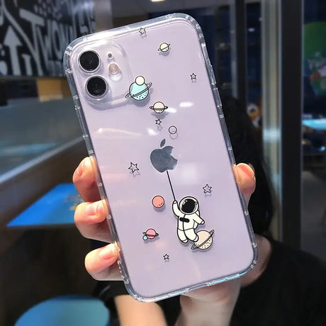 a person holding a phone case with a cartoon character on it