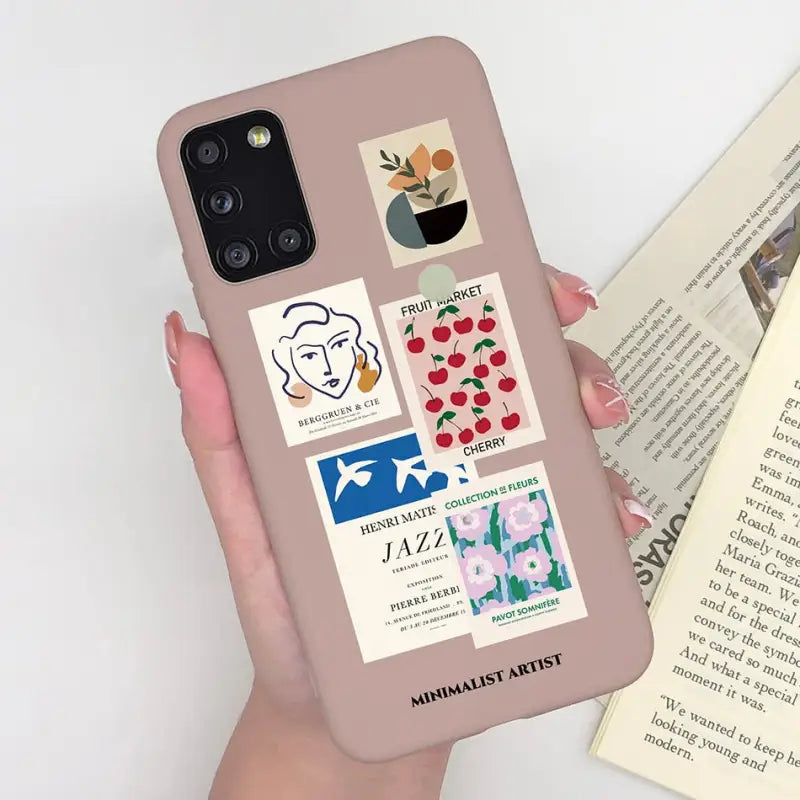 someone holding a phone case with stickers on it