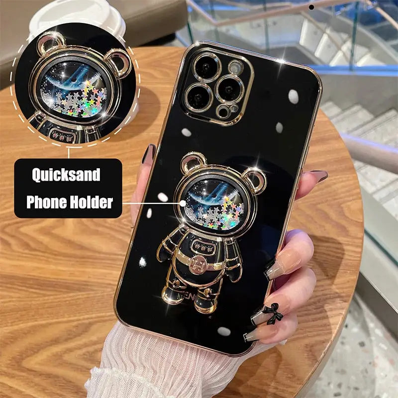 a person holding a phone case with a watch