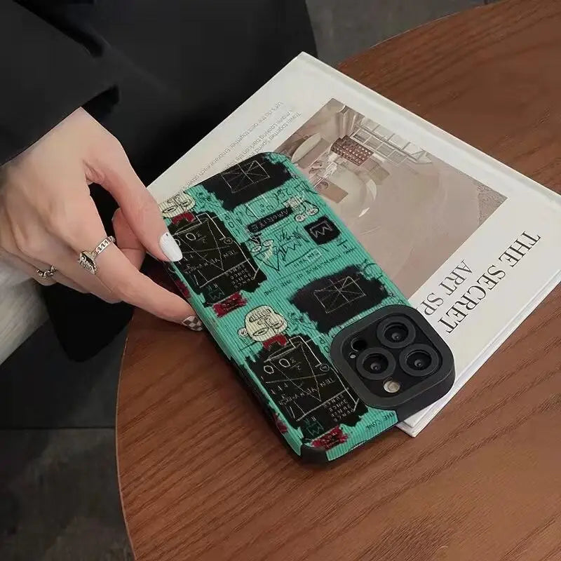 a person holding a phone case with a circuit board