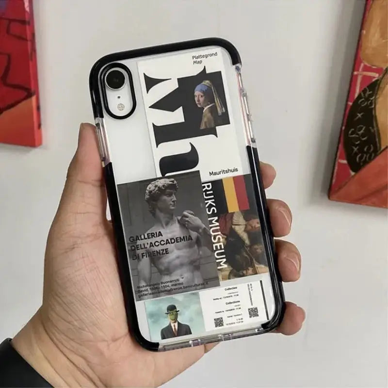 a person holding a phone case with a magazine cover