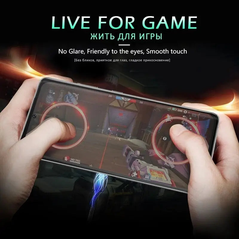 a person holding a phone with a game on it