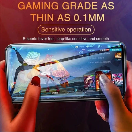 a person holding a phone with a game on it