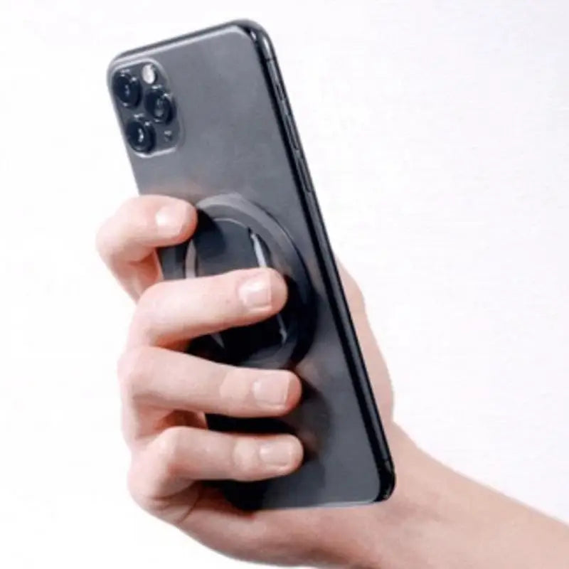 a person holding a phone in their hand