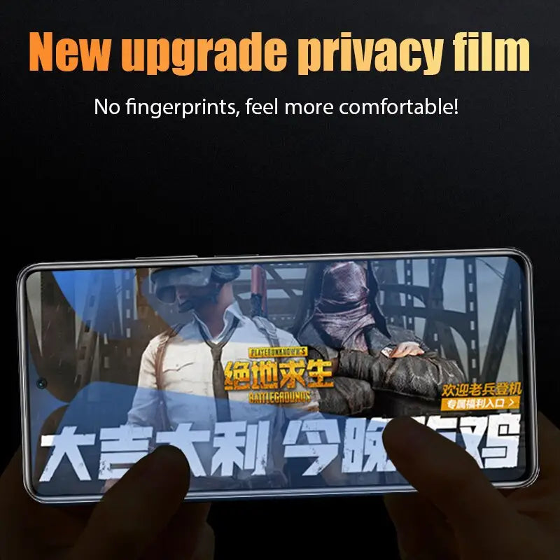 a person holding a phone with a movie on it