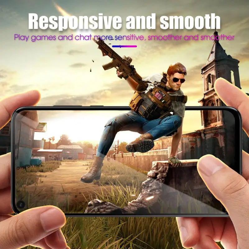 a person holding a phone with a game on it