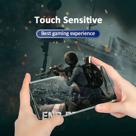 a person holding a phone with the text touch sensitive