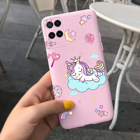 a pink phone case with a unicorn on it