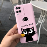 a person holding a pink phone case with a black cat on it