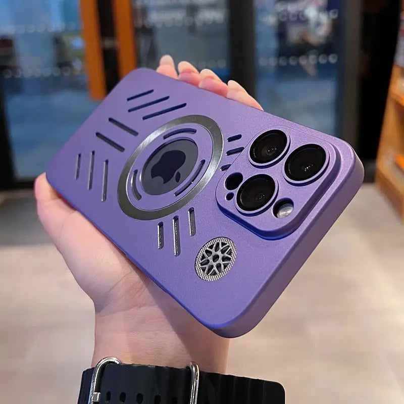 someone holding a purple case with a camera on it