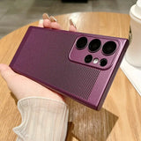 a person holding a purple phone case