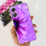 a person holding a purple flower phone case