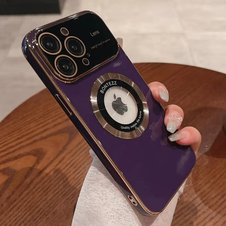 a person holding a purple iphone
