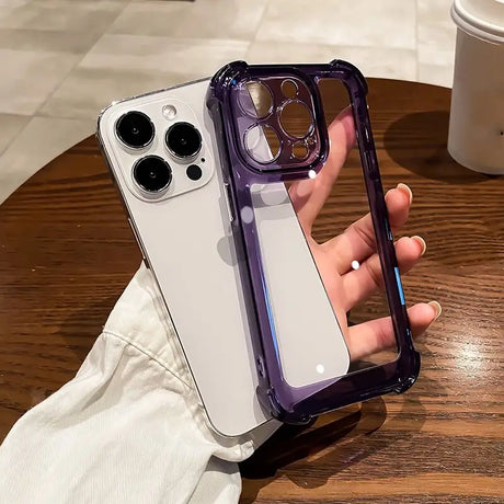 a person holding a purple iphone case