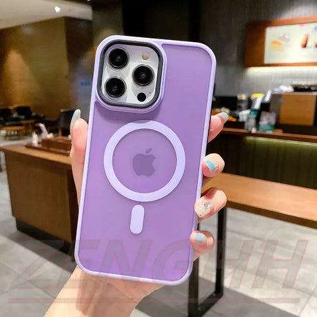 a person holding a purple iphone case