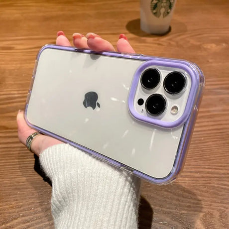 a person holding a purple iphone case