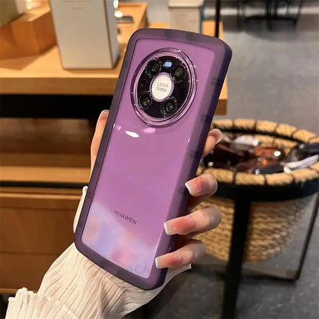 a person holding a purple phone case