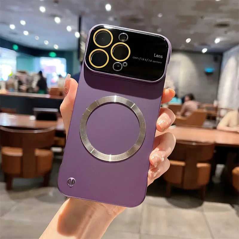 a person holding a purple phone in their hand
