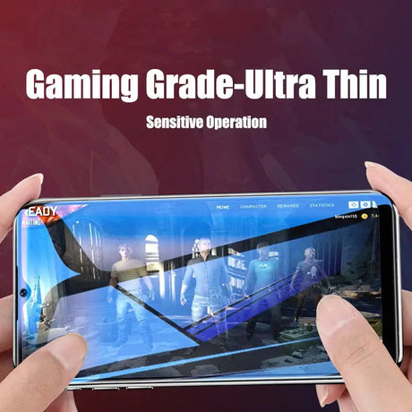 a person holding a phone with a game on it