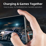 a hand holding a smartphone with a car game on it