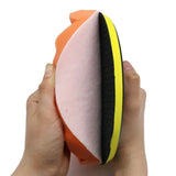 someone is holding a sponge with a sponge on it